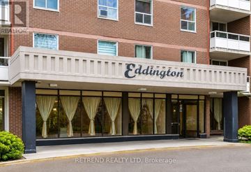 Toronto (Newtonbrook West) condo for rent - The front of a building named Eddington with a sign for Retrend Realty LTD, Brokerage.