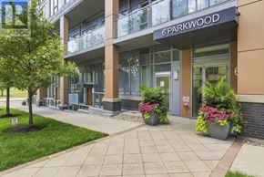 Toronto (Casa Loma) condo for rent - The front of a building with the name 6 Parkwood on it.