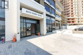 Milton (Co Coates) condo for rent - A building with the sign 8010 Derry Road is shown.