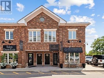 Vaughan (Kleinburg) apartment for rent - A brick building with Salon Dantel Luts and The Diamond Law offices.