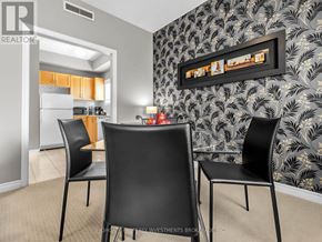 Vaughan (Kleinburg) apartment for rent - Three black chairs are placed in front of a wallpapered wall.