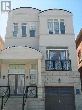 Vaughan (Patterson) apartment for rent - A two-story building with a balcony on the second floor.