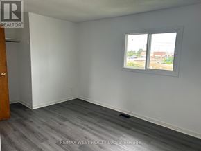 Brampton (Vales Of Castlemore) apartment for rent - A room with a window and a door.