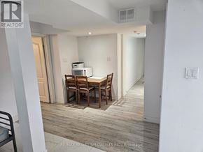 Mississauga (Churchill Meadows) apartment for rent - A dining room with a table and chairs.
