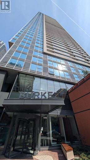 Toronto (North St. James Town) condo for rent - A tall building with the word "BURKE" on the front.