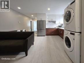 Burnaby apartment for rent - A modern laundry room with a washer and dryer.