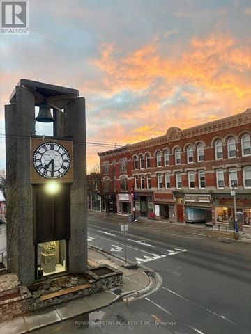 Prescott multi-family for rent - A large clock tower stands in the middle of a street.