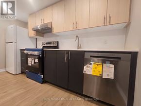Toronto (Bayview Village) apartment for rent - A kitchen with a fridge and a dishwasher.