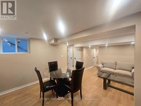 Toronto (Bayview Village) apartment for rent - A dining room with a glass table and chairs.