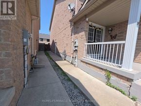 Brampton (Fletcher's Creek South) apartment for rent - A residential area with a house and a sign that says REALTOR.