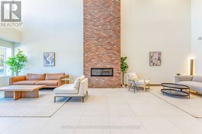 Clearview (Creemore) condo for rent - A living room with a fireplace and a couch.