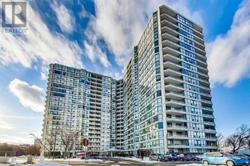 Toronto (Agincourt South-Malvern West) condo for rent - A tall residential building with many windows is shown in the image.