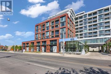 Toronto (Dovercourt-Wallace Emerson-Junction) condo for rent - A modern red brick building with the number 858 on it.