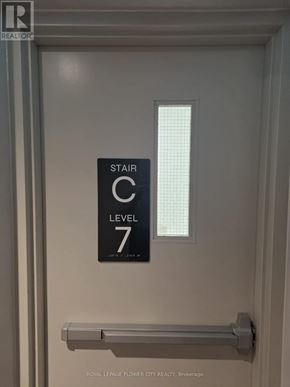Hamilton (Corktown) condo for rent - A sign on a door reads "STAIR C7 LEVEL 7".