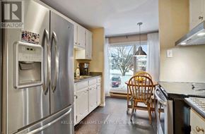 London South (South R) house for rent - A kitchen with a refrigerator, dishwasher, and oven.