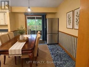 London North (North K) apartment for rent - A dining room with a wooden table and chairs.
