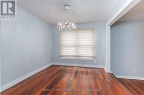 Whitby (Blue Grass Meadows) apartment for rent - A room with wooden floors and a chandelier.