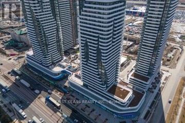 Vaughan (Vaughan Corporate Centre) condo for rent - A First Class Realty building is seen from a high angle.