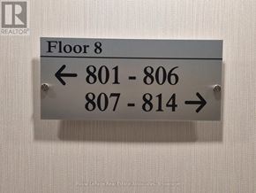 Mississauga (Clarkson) condo for rent - A sign for Floor 8 with directions to rooms 801-806 and 807-814.