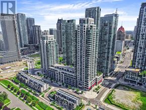 Mississauga (Creditview) condo for rent - A cityscape with tall buildings and a clear sky.