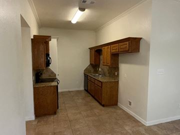 Temple triplex for rent - A kitchen with a sink and cabinets.