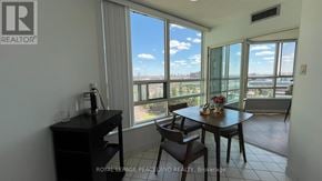 Markham (Aileen-Willowbrook) condo for rent - A dining room with a table set for two and a view of the outside.