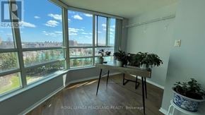 Markham (Aileen-Willowbrook) condo for rent - A room with a large window overlooking a landscape.