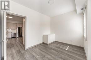 Hamilton (Landsdale) multi-family for rent - A room with a white wall and a wooden floor.