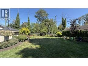Vancouver apartment for rent - A well-maintained lawn with a clear blue sky above.