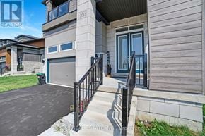 Severn (West Shore) apartment for rent - A house with a grey front yard and a black railing.