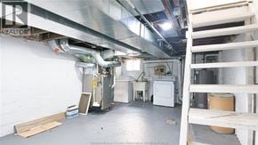 Windsor apartment for rent - A room with a lot of pipes and a ladder.