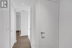 Mississauga (City Centre) condo for rent - A hallway with a door on the right and a door on the left.