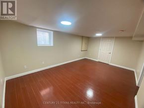 Ajax (Central West) apartment for rent - A room with wooden flooring and a window.