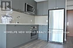 Toronto (Henry Farm) condo for rent - A kitchen with a refrigerator, microwave, and oven.