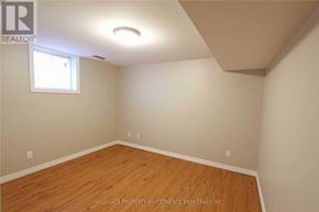 Barrie (Cundles East) apartment for rent - A room with wooden flooring and a window.