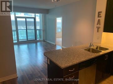 Toronto (Waterfront Communities) condo for rent - A kitchen with a granite countertop and a sink.