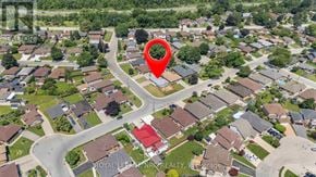 Hamilton (Kentley) apartment for rent - An aerial view of a residential area with a red pin marking a specific location.