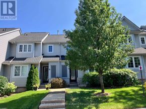 Blue Mountains townhouse for rent - A house with a tree in front of it.
