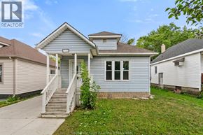 Windsor apartment for rent - A house with a blue roof and a white porch.