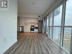Vaughan (Vaughan Corporate Centre) condo for rent - A spacious kitchen with a view of the city.