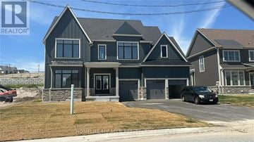 Oro-Medonte apartment for rent - A large, two-story house with a garage is for sale.
