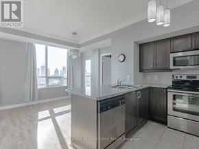 Mississauga (City Centre) condo for rent - A kitchen with a stainless steel dishwasher and oven.