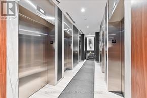 Toronto (Mount Pleasant West) condo for rent - A long hallway with elevators on both sides.