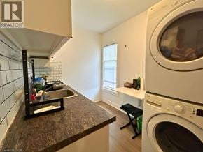 Hamilton apartment for rent - A laundry room with a washer and dryer.