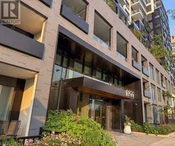 Toronto (York University Heights) condo for rent - A modern building with the number 1109 on the front.