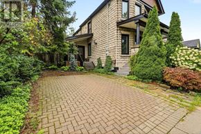 Hamilton (Kirkendall) apartment for rent - A house with a brick pathway leading to the front door.