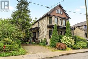 Hamilton (Kirkendall) apartment for rent - A house with a well-maintained garden in front.