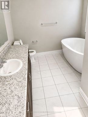 Cambridge apartment for rent - A white bathroom with a sink, toilet and bathtub.