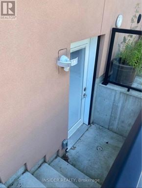Hamilton (Buchanan) apartment for rent - A small white door with a window above it.