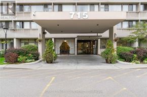 Toronto (Flemingdon Park) condo for rent - The entrance to a building with the number 715 on it.